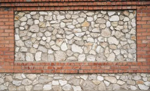 Old brick wall, old texture of stone blocks closeup Stock Photos