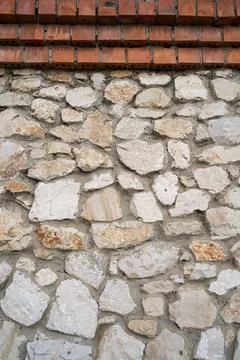 Old brick wall, old texture of stone blocks closeup Stock Photos