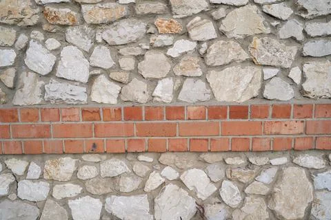 Old brick wall, old texture of stone blocks closeup Stock Photos