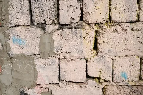 Old brick wall, old texture of stone blocks closeup Stock Photos