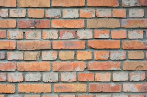 Old brick wall, old texture of red stone blocks closeup Stock Photos