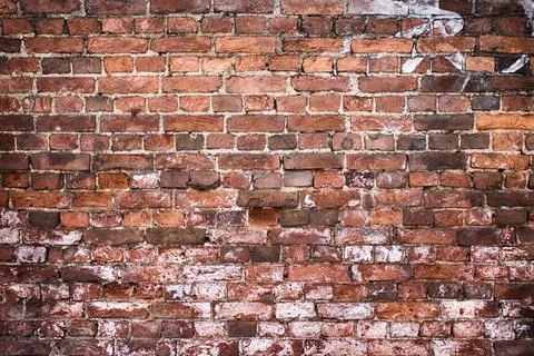 Old brick wall, old texture of red stone blocks closeup 写真素材