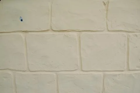 Old brick wall with peeling plaster, grunge background 写真素材