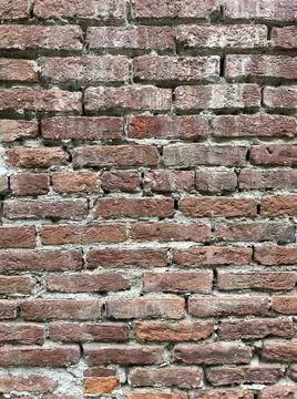Old brick wall of red baked clay Stock Photos