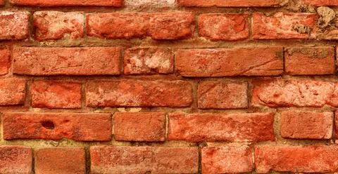 An old brick wall, red brick. Stock Photos