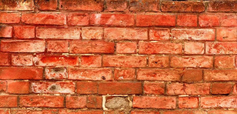 An old brick wall, red brick. Stock Photos
