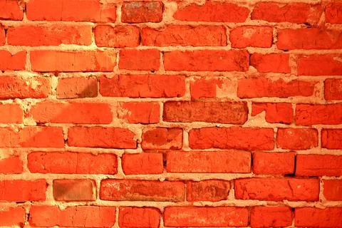 An old brick wall, red brick. Stock Photos