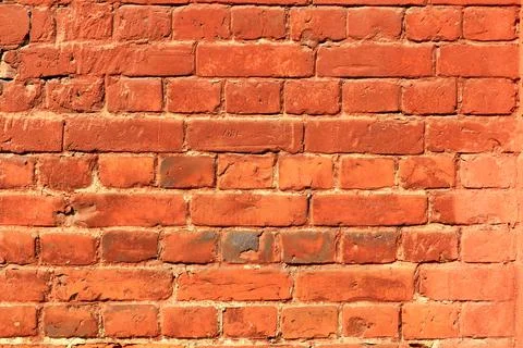 An old brick wall, red brick. Stock Photos
