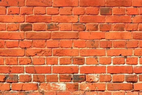 An old brick wall, red brick. Stock Photos