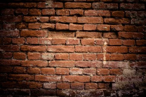 Old brick wall. Retro background. Closeup. Stock Photos