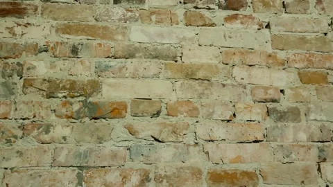 Old Brick Wall with Rough Surface. Textured damaged background. Stock Footage 294928382