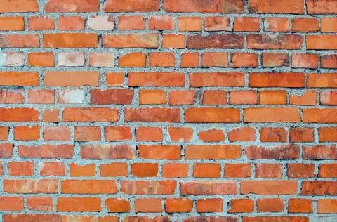 Old brick wall. Rustic old brickwork. The structure and pattern of a destroye Stock Photos