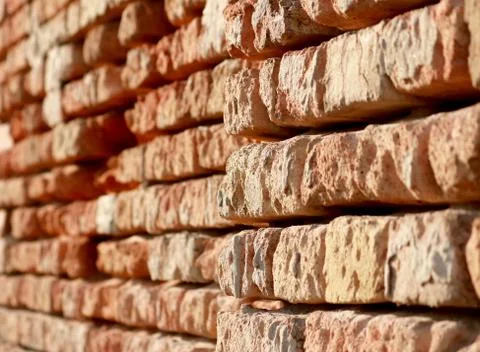 Old brick wall in the sun Stock Photos