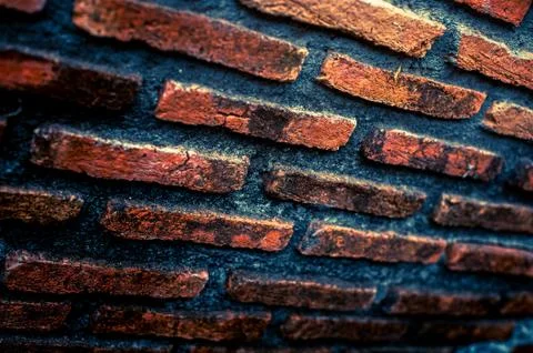 Old brick wall texture in a background image Stock Photos