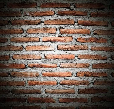 Old brick wall texture in a background image Stock Photos