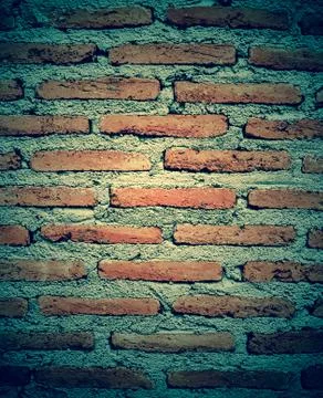 Old brick wall texture in a background image Stock Photos