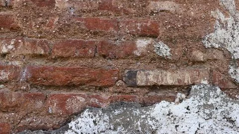 Old Brick Wall Texture Background with Peeling White Paint. Stock Photos
