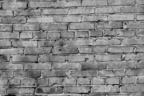 Old brick wall texture close up. Brick wall background black and white Stockfoto's