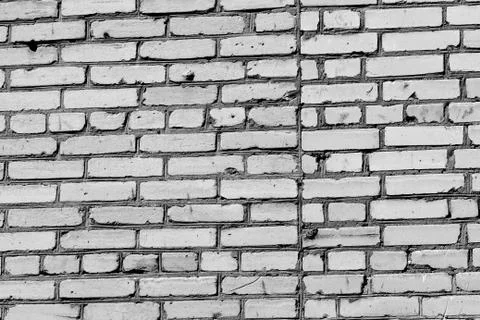 Old brick wall texture close up. Brick wall background black and white Stockfoto's