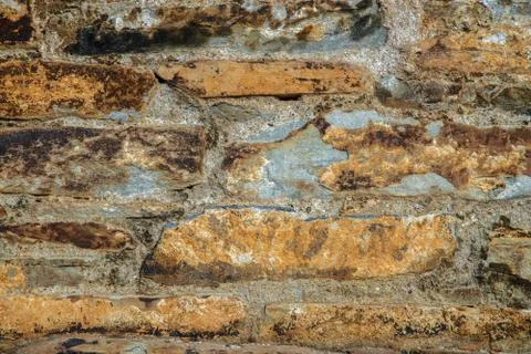 Old brick wall texture. Grunge background of aged stone surface Stock Photos