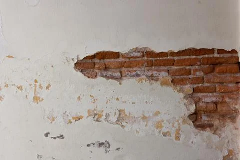Old brick wall Texture. Painted Distressed Wall Surface.brick background Photos