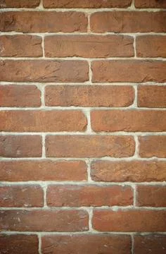 Old brick wall texture. The wall, made of old red bricks, darkened by old a.. Stock Photos