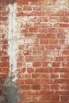 Old brick wall texture. The wall, made of old red bricks, darkened by old a.. Stock Photos