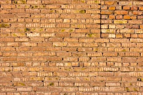 Old brick wall, weathered texture, grunge background 库存照片