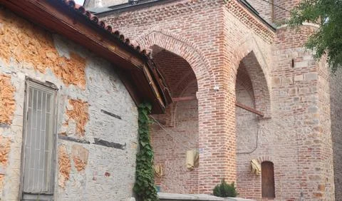 Old brick wall with a window, old masonry, remake. Stock Photos