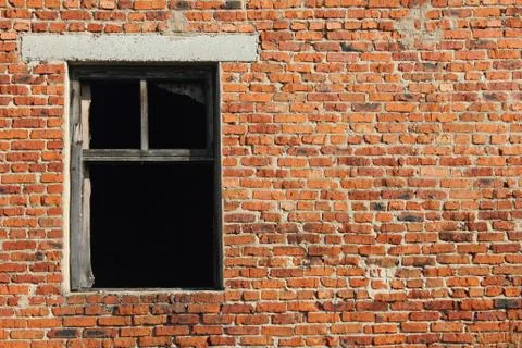 Old brick wall with window Stock Photos