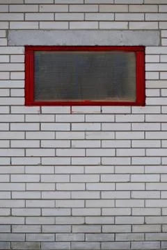 Old brick wall with window. Stock Photos