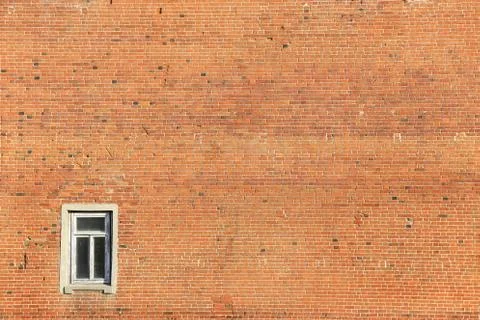 Old brick wall with window Stock Photos