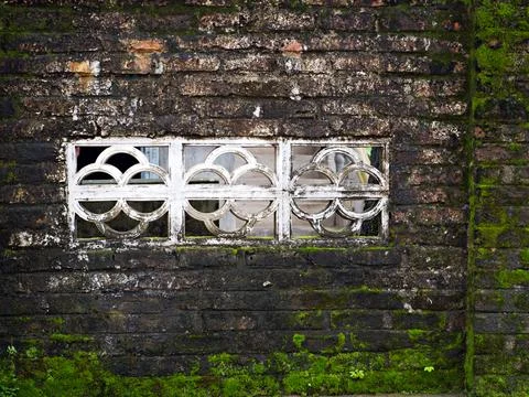 Old brick wall with window Stock Photos