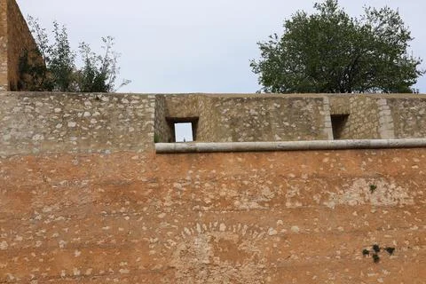 Old brick wall with windows Stock Photos