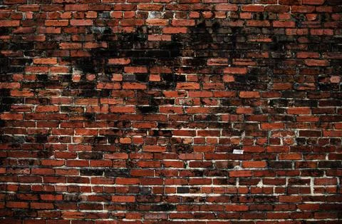 Old brick wallpaper. Bricks pattern. Brick wall with textured red surface Stock Photos
