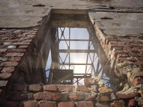 Old brick window on abandoned construction building Stock Photos