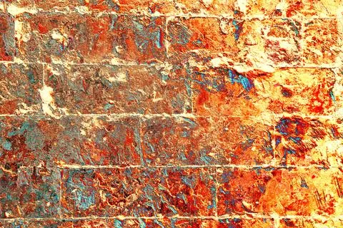 Old brickwork covered with peeling plaster, brick and cement at the joints be Stock Photos