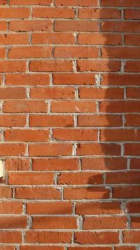 Old brickwork fragment vertical picture Stock Photos
