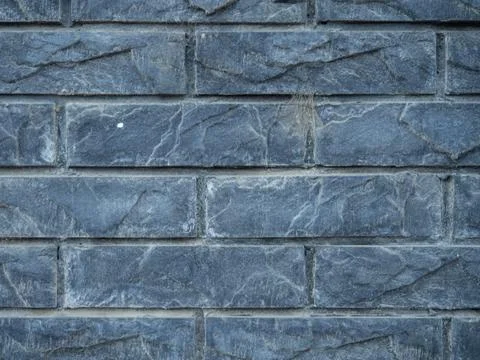 Old brickwork. Stone texture. Stone background. Gray blocks with cobwebs. Stock Photos