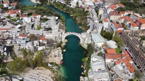 Old bridge above Neretva river in Mostar, Bosnia and Herzegovina. Video stock 332551494