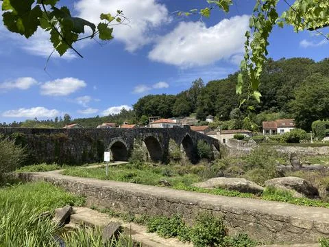 The Old Bridge, bridge over the river Tambre in Galicia, Spain. Stock Photos