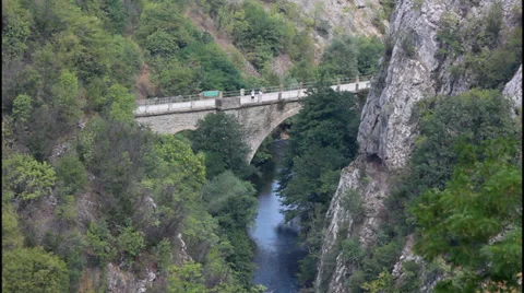 Old bridge, canyon, river Video stock 32278923
