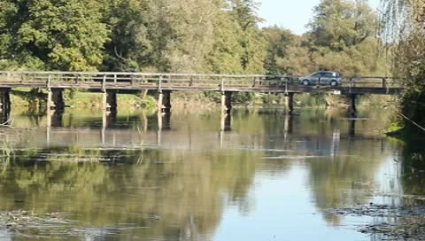 Old bridge, car passing over Stock Footage 8912668