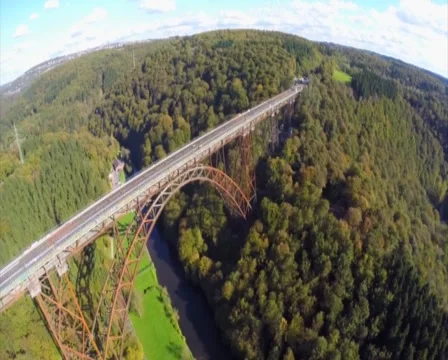 Old bridge constriction over valley river aerial shot Mungstener, click for HD Stock Footage 43910279