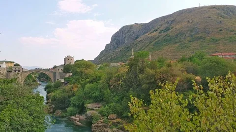 Old bridge of Mostar and  Neretva river, Bosnia and Herzegovina Video stock 83687553
