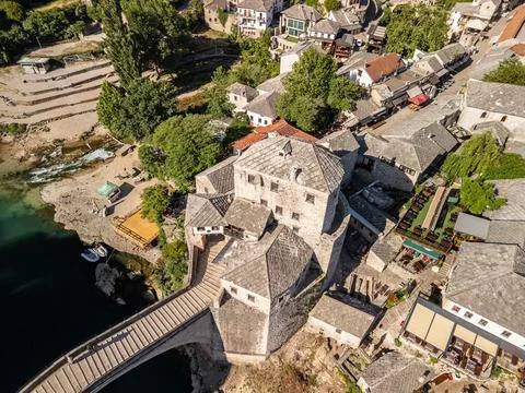 Old Bridge Mostar Angled Drone Photo with Halebija Tower and Beach Below Фото