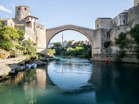 Old Bridge Mostar Frontal Drone Photo with Koski Mosque and Blue Neretva Stock Photos