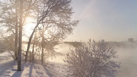 The old bridge over the Angara river. Steam is emitted from the wate Stock-Footage 165611451