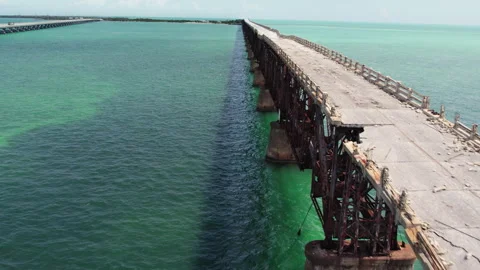 Old bridge over blue, clean waters Stock Footage 308975162