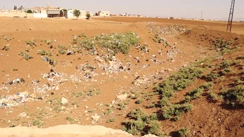 Old bridge over dried river with pollution, symbol of drought and neglect Stock Footage 320993826